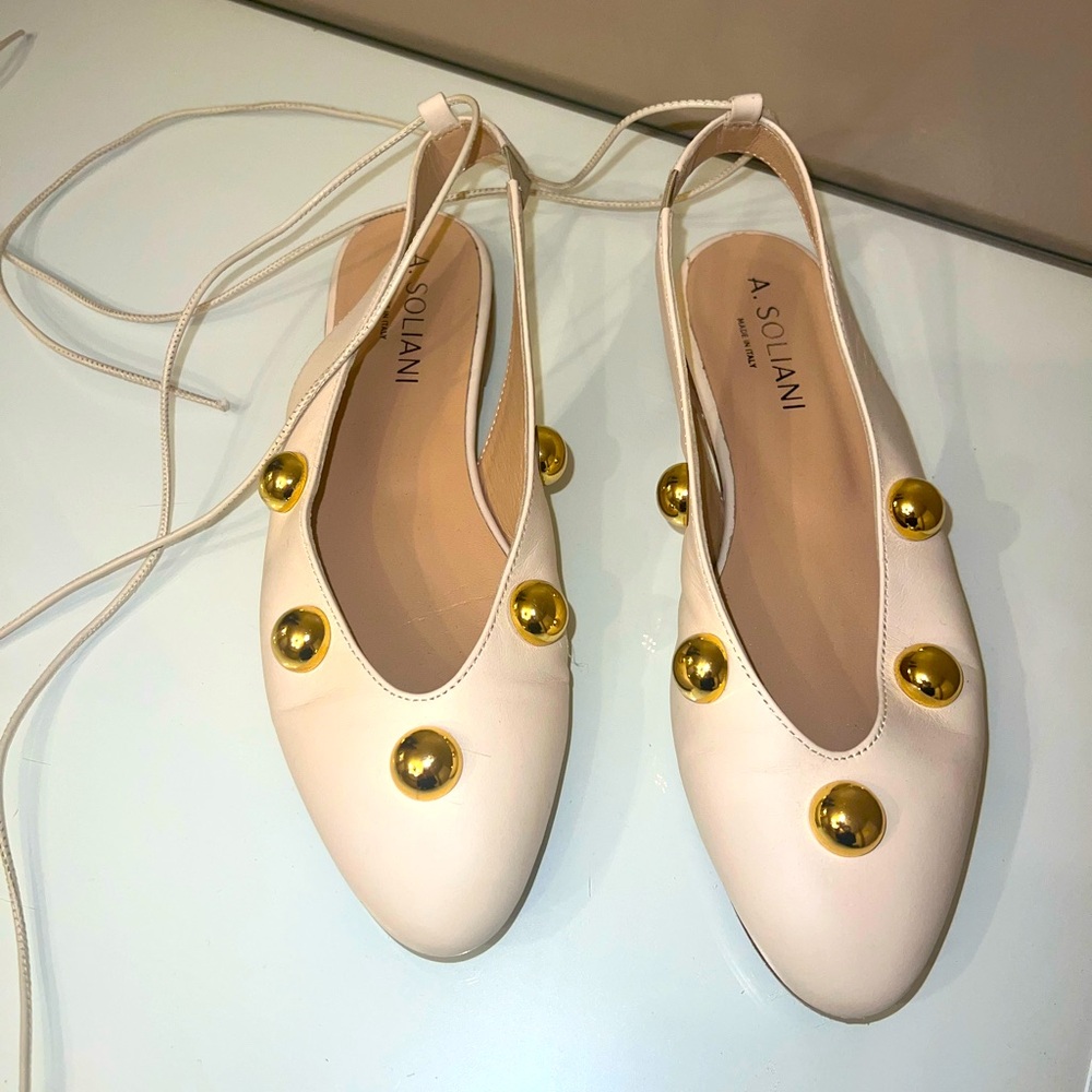 Cream colored leather slingbacks shoes with gold studs. Size 37,  gently worn.
